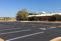Working amidst all sorts of Summer School activities, Garrett Paving sealcoated and striped more than 176,000 sq. ft. of pavement.