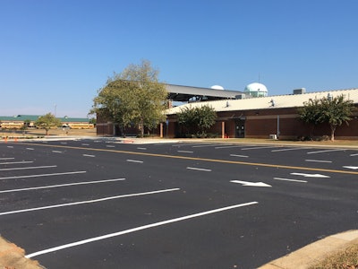Working amidst all sorts of Summer School activities, Garrett Paving sealcoated and striped more than 176,000 sq. ft. of pavement.