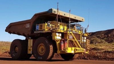A standard truck 830E with the AHS retrofit kit running in autonomous mode at Rio Tinto’s mine in Australia.