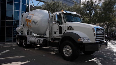 The signature item at this year's CIM Auction was a Mack Granite Axle Back model mounted with a McNeilus 10.5-cubic-yard M77 paver mixer.