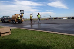 Cody says they apply sealer using squeegee or spray depending on what the customer wants, and the glass in sealer goes down no differently than sand or boiler slag. He says the glass has created no issues with the spray sealcoating system. In fact he says he thinks silica sand might wear out a spray system quicker.