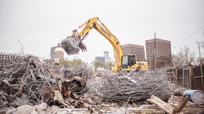 The demolition contractor recycled 8,800 tons of various metals, 59,650 tons of concrete and 4,600 square feet of marble resulting in 98.7% of all demolition debris being recycled.