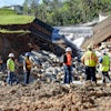Spillway completely damaged. Thompson’s staff first day on the job evaluating the upcoming project.