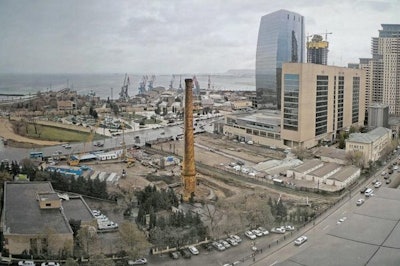 Pictured here is the a historic industrial chimney at the heart of The Twin Towers Port of Baku scheme prior to the restoration project.
