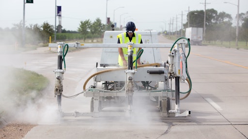 Concrete contractor Thrasher worked with Minnich to develop a custom pneumatic drilling machine with three 50-lb. rock drills mounted to a self-propelled platform assembly.