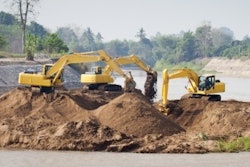 Excavators At Jobsite Freedigitalphotos