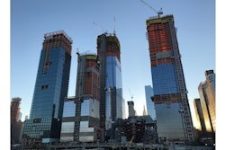 The Hudson Yards project includes office towers, 4,000 residences, a 750-seat public school, shops and restaurants, a new art center and 14 acres of public open space. It is constructed on two “platforms” that bridge over 30 active Long Island Rail Road train tracks; 300 caissons (4 to 5 ft. in diameter, 20 to 80 ft. deep) support the platforms and buildings.