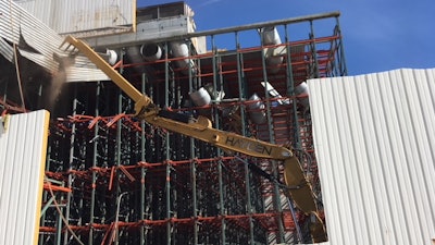 Hayden Wrecking Corporation used an excavator with a shear to demolish sections of the structure.