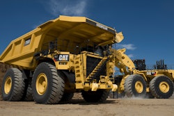Cat 793 F Mining Truck Being Loaded By Cat Wheel Loader