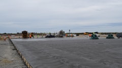 Figure 1: Large slab on grade placement utilizing truck dump and laser screed strike-off.