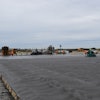 Figure 1: Large slab on grade placement utilizing truck dump and laser screed strike-off.