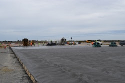 Figure 1: Large slab on grade placement utilizing truck dump and laser screed strike-off.