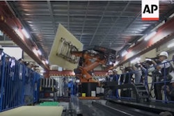 Shimizu Corp., one of Japan’s largest general contractors, shifted trials of autonomous construction robots such as this roofing and flooring machine into high gear, and expects to have it working on a construction site in fall 2018.
