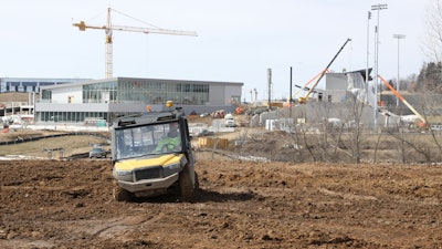 Designed specifically for excavation and construction sites, the UTV offers a long swing-arm suspension, custom-tuned springs and shocks.