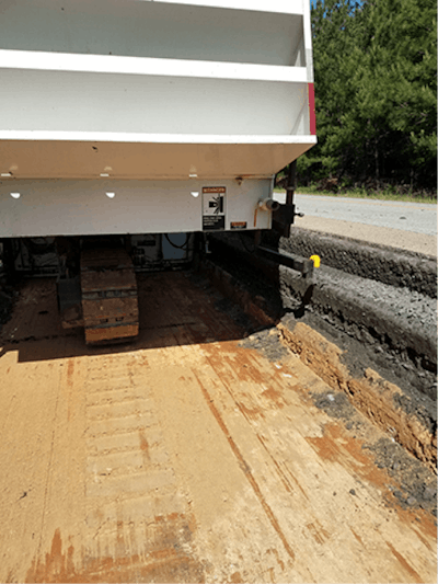 This photo was snapped when the RX 900E was cutting 28-ft. wide and 42-in. deep—almost 4-ft deep.