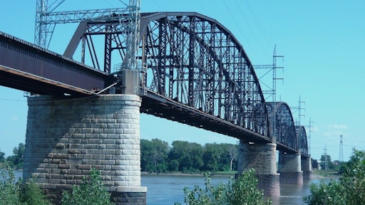 Bids were accepted in February, but in June the administration denied a grant that would have financed a third of the cost to replace The Merchant's Bridge, a Mississippi River rail crossing at St. Louis. Coupled with the escalating cost of the necessary 12,500 tons of steel, the project's future is uncertain.