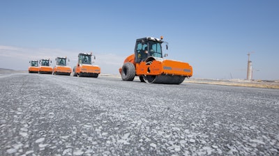 Hamm rollers tackle compacting the water-bound base/cement treated base.