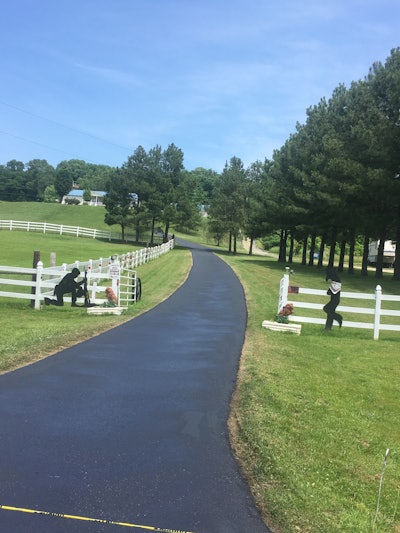 “Especially on a hill you have to make sure not to put down too much material because it will run,” Warren Johnson says. “We like this approach vs squeeging for cutting it in. We get a lot of return work and complements that we didn’t spray the grass or get sealer all over everything.”
