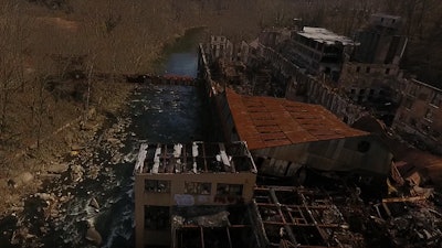 Just prior to signing the demolition contract, the Rockford Falls buildings caught fire, creating an additional set of challenges for the demolition contractor.