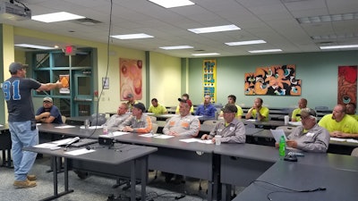 A Schlouch Inc. team meeting. “Leadership must be very open and honest when it comes to safety,” says Don Swasing. “As we’ve transformed our culture, it has been important to celebrate good results. At the same time, when you have a near miss, you have to immediately let everyone know.”