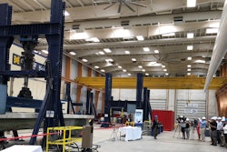 Engineers, Maine Department of Transportation officials, business leaders, investors, researchers, and University of Maine staff watched a stackable, composite girder with precast concrete deck panels exceed twice the collapse strength of steel and concrete girders.