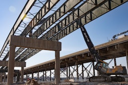 Greg Bair Track Hoe Service used the Volvo EC480 HR high-reach excavator on both land and water during the demolition of the Interstate 70 westbound bridge outside downtown Kansas City, KS.