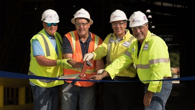 Ribbon cutting at the new 21,000 square-foot facility in Brooksville, Fla., Wednesday to celebrate the opening of the plant.