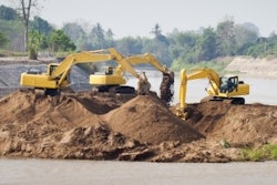 Excavators At Jobsite Freedigitalphotos
