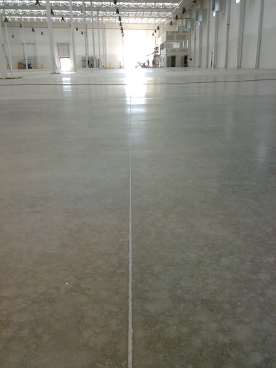 After the application pictured here is what a control joint on warehouse floor should look like.