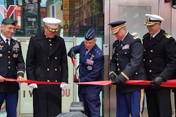 Cutting the ribbon to open the Times Square recruiting station.