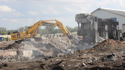 DT Specialized Services used several heavy machines, varying from skid steers to PC 490s with rotating grapples, hammers and buckets