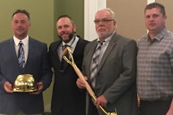 At the NUCA PA award ceremondy (from left) Steve Funk, General Superintendent, Schlouch Inc.; Chuck Fehlinger, NUCA PA President; Don Swasing, Chief Operating Officer, Schlouch Inc.; and William Kukurin, NUCA PA Vice-President.
