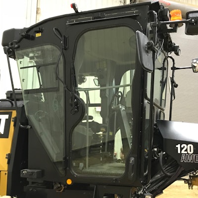 Back-of-cab C-pillar is gone from Cat graders, opening up view to the tandems.