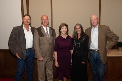 Lance Griffin, Director of Aggregates - Texas Region, CEMEX USA, and Former First Lady Mrs. Laura Bush flanked by members of the El Carmen Land and Conservation Co., LLC.