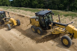 Wheel-and-lever-equipped 120 grader has a flat-front cab (right), and the joystick-controlled 120 gets the angled front.