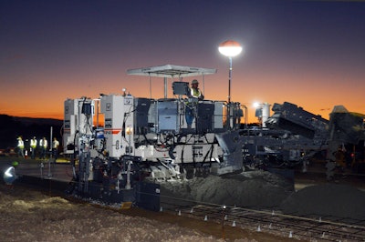At dawn, Larry Young Paving places entranceway to Southern Pointe Community.