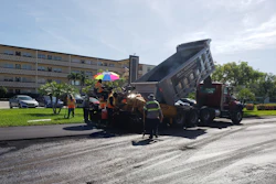 Approximately 18 crew members were directly involved in the project, including ten on the paving crew, five on the milling crew, and four doing the striping.