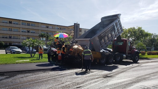 Approximately 18 crew members were directly involved in the project, including ten on the paving crew, five on the milling crew, and four doing the striping.