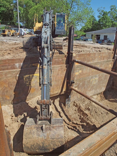 The Slide Rail System keeps constant pressure against the surrounding dirt, allowing the exact amount of removal and replacement of the contaminated soil.