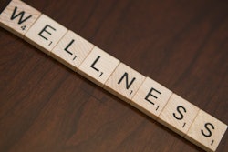 Wellness aims at preventing illness and injury and prolonging a healthy life as opposed to treating after the fact.