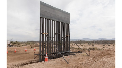 Construction crews staged material needed for the Santa Teresa Border Wall Replacement project near the Santa Teresa Port of Entry. The staging area also showcases a scaled down example of what the bollard style wall will look like.