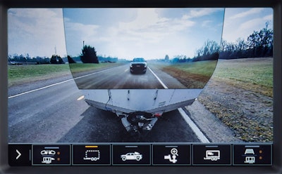 2020 GMC Sierra HD Transparent Trailer camera view shows following traffic.
