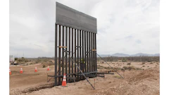 Construction crews staged material needed for the Santa Teresa Border Wall Replacement project near the Santa Teresa Port of Entry. The staging area also showcases a scaled down example of what the bollard style wall will look like.
