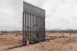 Construction crews staged material needed for the Santa Teresa Border Wall Replacement project near the Santa Teresa Port of Entry. The staging area also showcases a scaled down example of what the bollard style wall will look like.