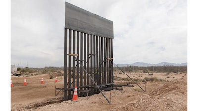 Construction crews staged material needed for the Santa Teresa Border Wall Replacement project near the Santa Teresa Port of Entry. The staging area also showcases a scaled down example of what the bollard style wall will look like.