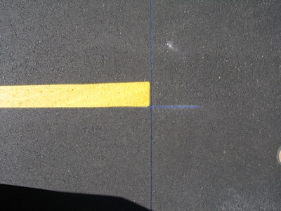 Blue chalk is easy to see on asphalt, sealcoat, and concrete pavement, but perhaps most importantly, the customer is almost guaranteed not to confuse it with messy paint markings.