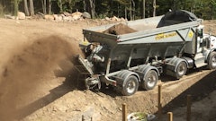 Gravel Conveyors Inc. is a Stone Slinger dealer, and the company operates a fleet of 12 trucks similar to this one fixed with the conveyors.