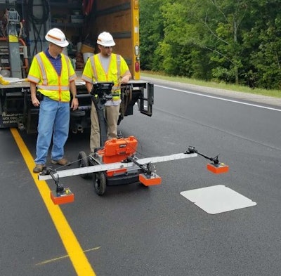 PaveScan RDM set up with three 2 gigahertz (GHz) sensors mounted on a portable push cart.