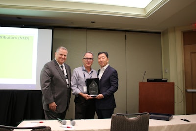 Pictured from left to right: Tom Owen- VP National CE Sales of Hyundai Construction Equipment Americas, Inc.; Kerry Vickar- chairman of the board of NED and MS Kang- President of Hyundai Construction Equipment Americas, Inc.