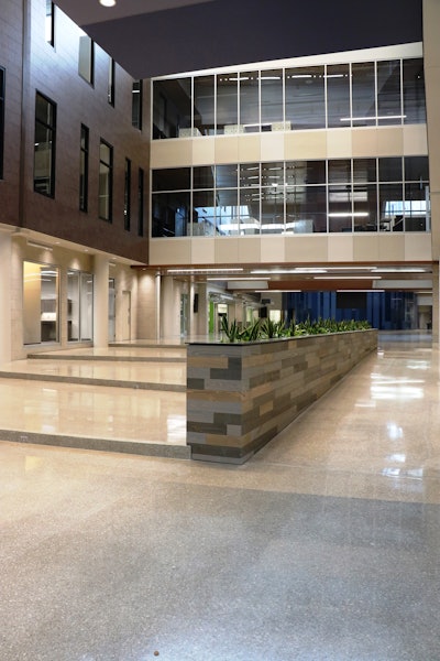 At Olathe West High School, Musselman & Hall placed 25,000 square-feet of 2”-thick Renaissance Deep Grind as an unbonded topping slab integrating local aggregates and references. The project was recognized by the Concrete Promotional Group for the 2017 Excellence In Concrete Awards - Judges Award.